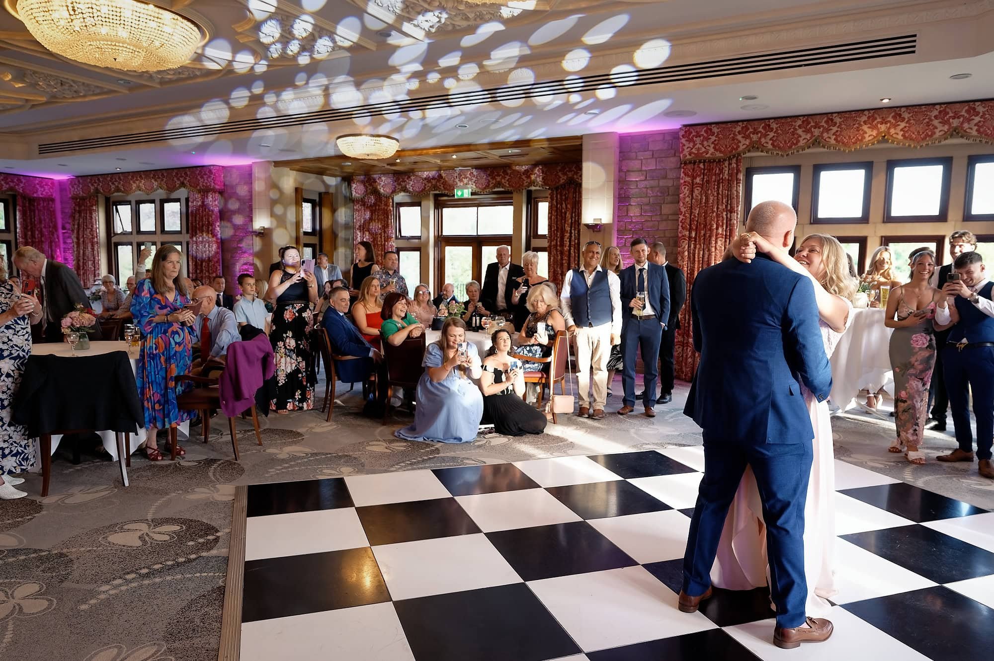 Bride and groom sharing their first dance at their South Lodge wedding reception, Horsham, West Sussex