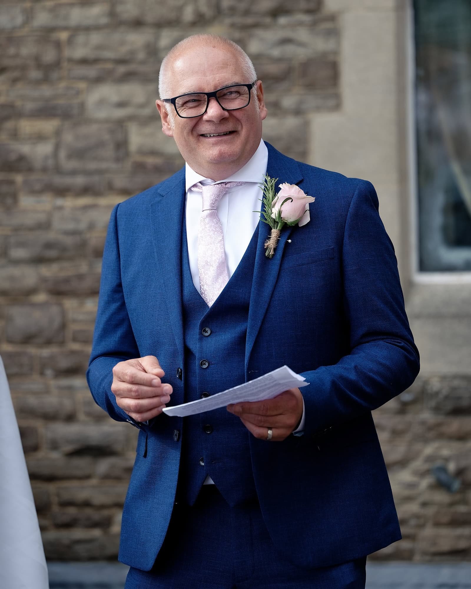 Groom giving his wedding speech on the terrace steps at the rear of South Lodge Hotel, Horsham, West Sussex