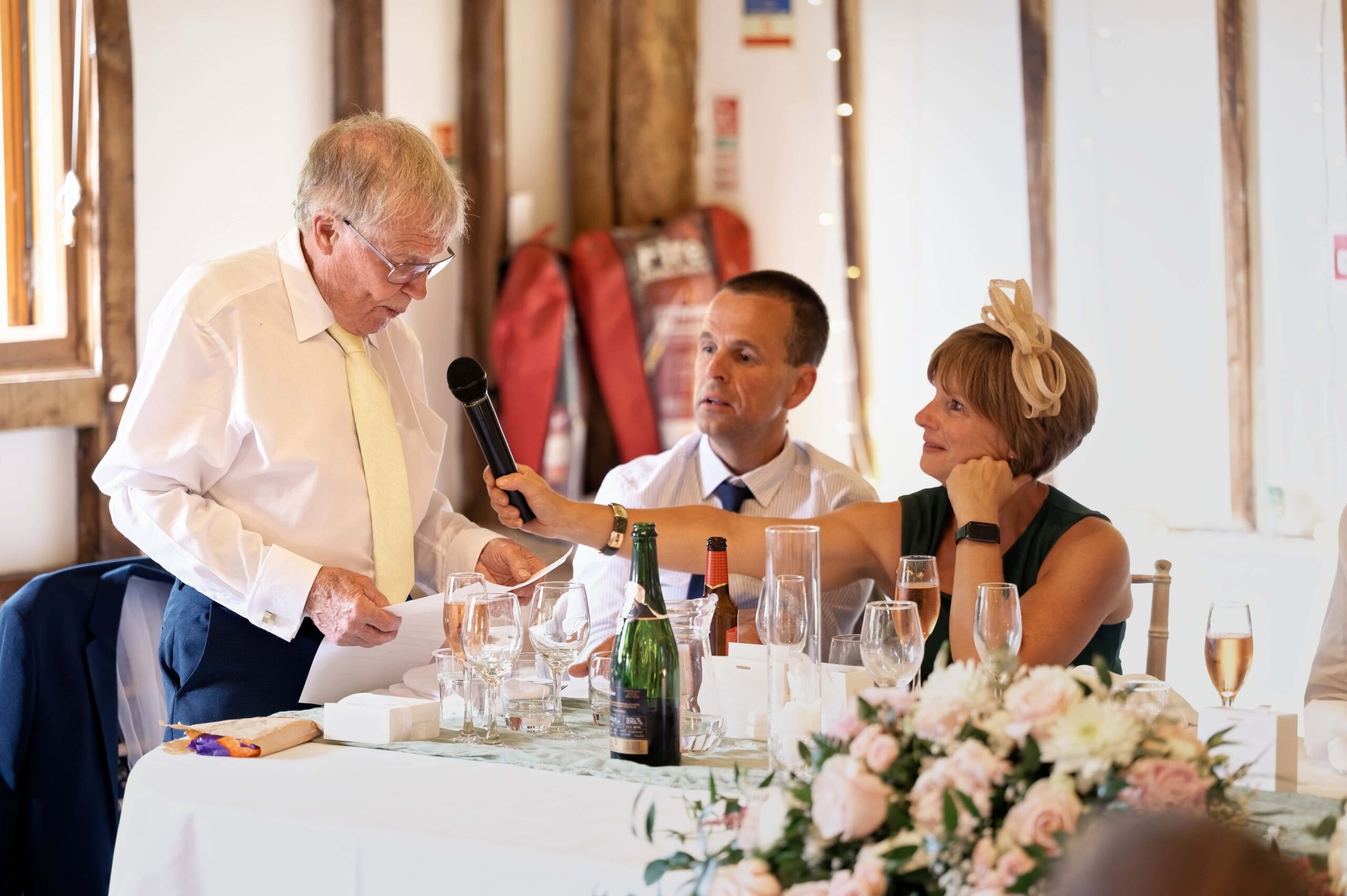Fitzleroi Barn wedding photographer capturing the Best Man delivering his speech
