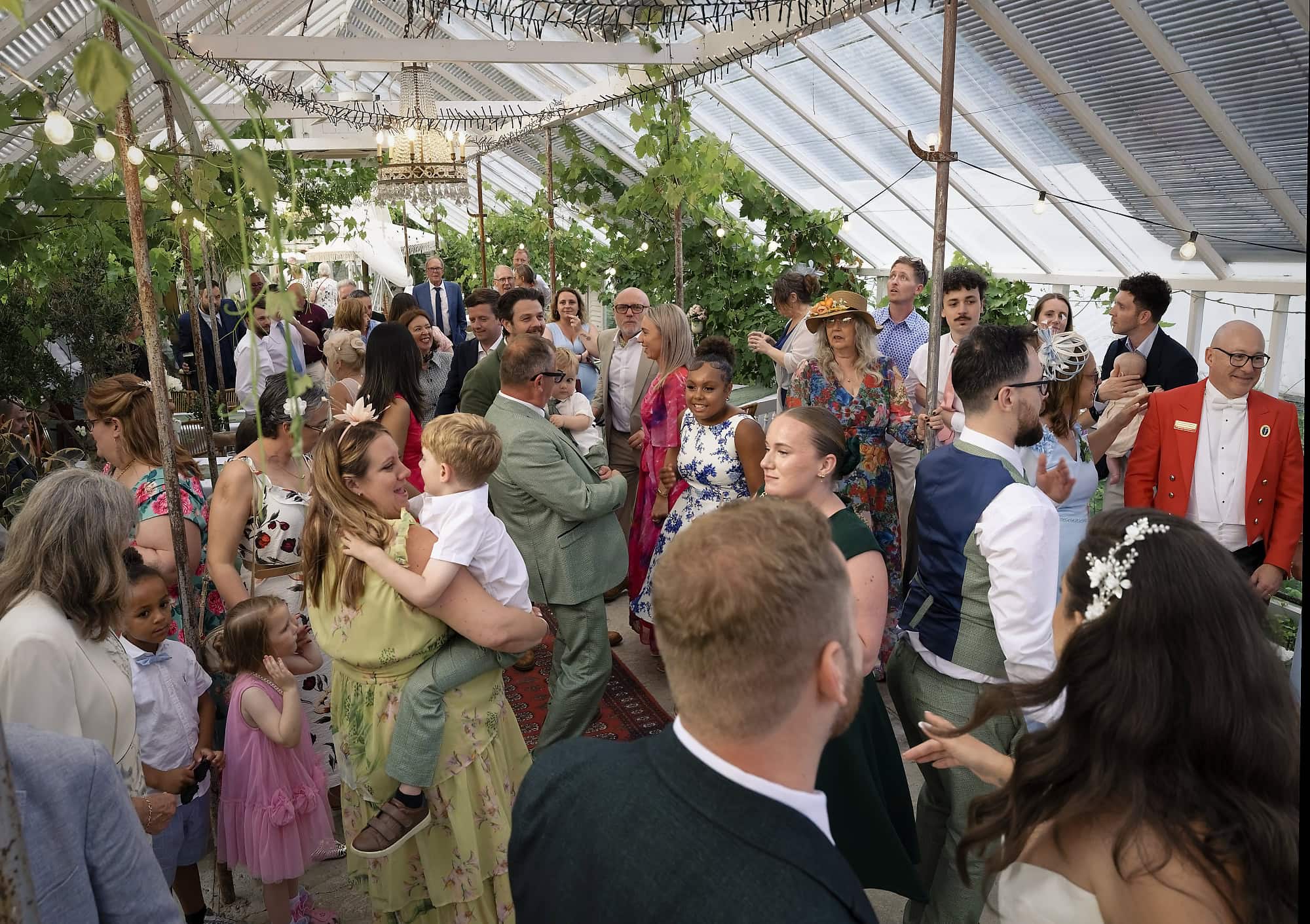 Wedding guests dancing on the dancefloor after the first dance