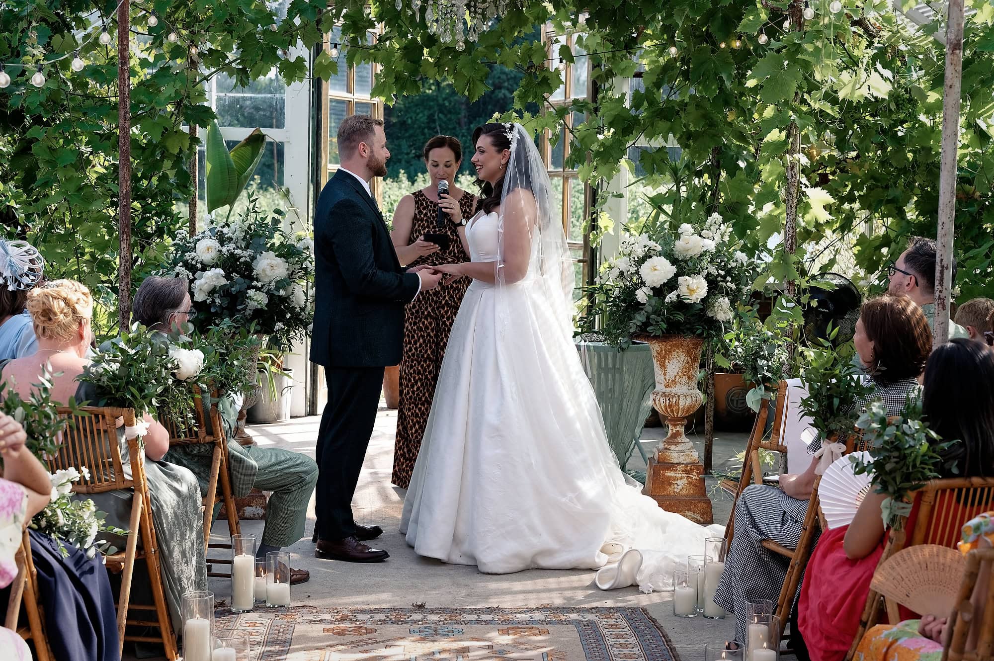 Celebrant officiating the ring exchange between the bride and groom