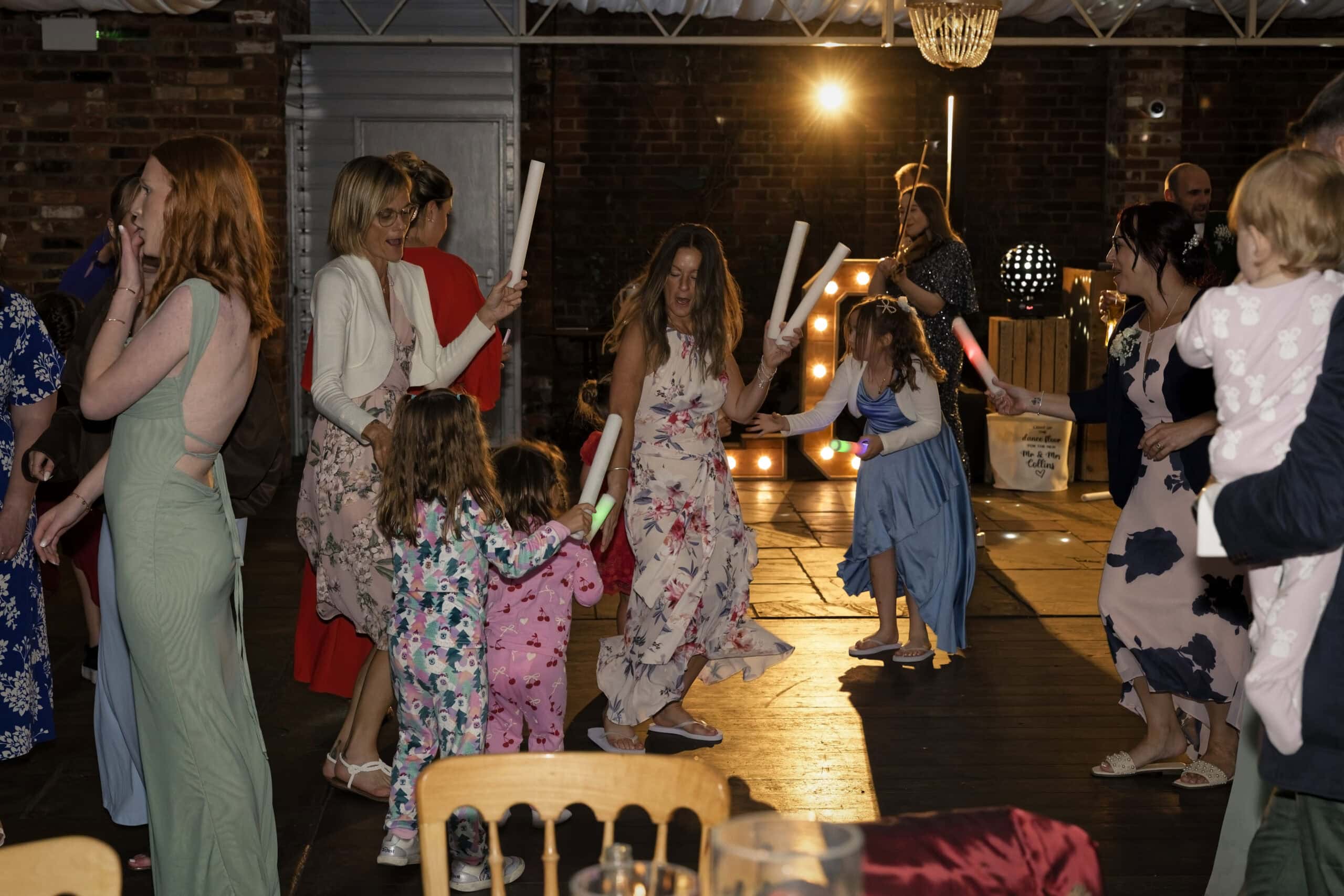 Wide shot of the packed evening dance floor
