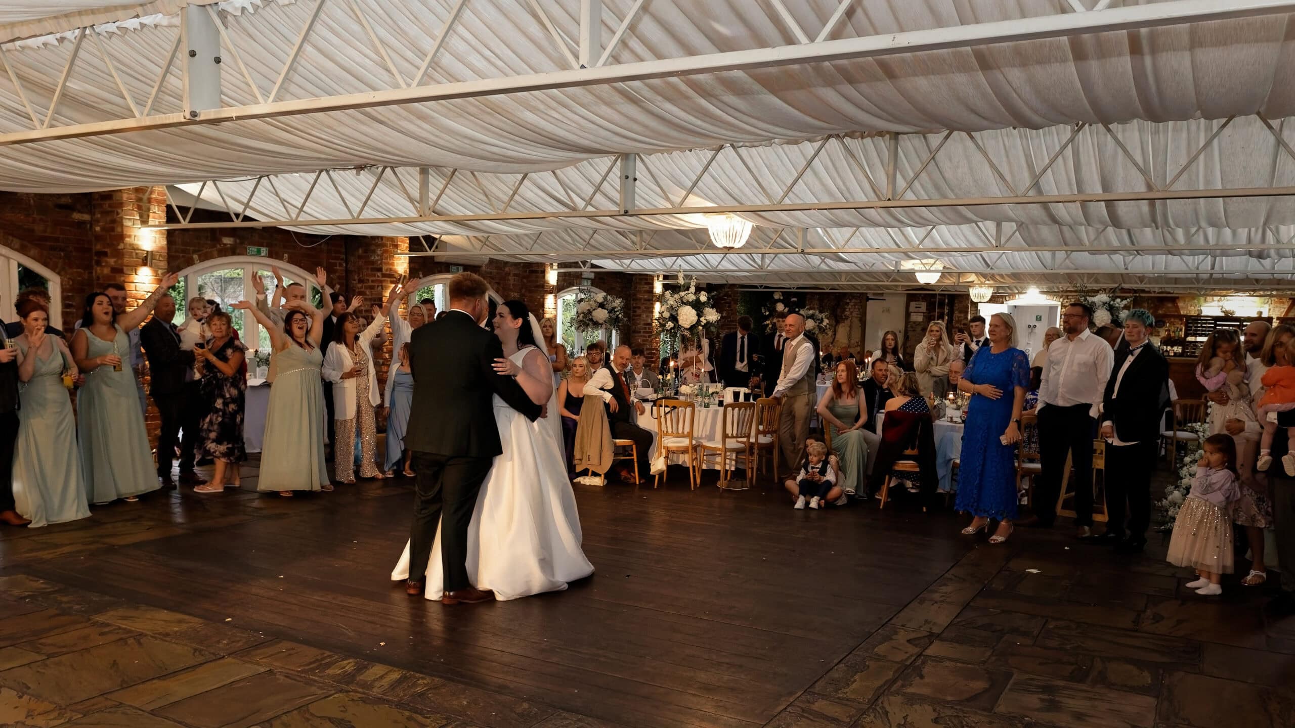 Wide shot of the first dance in the marquee