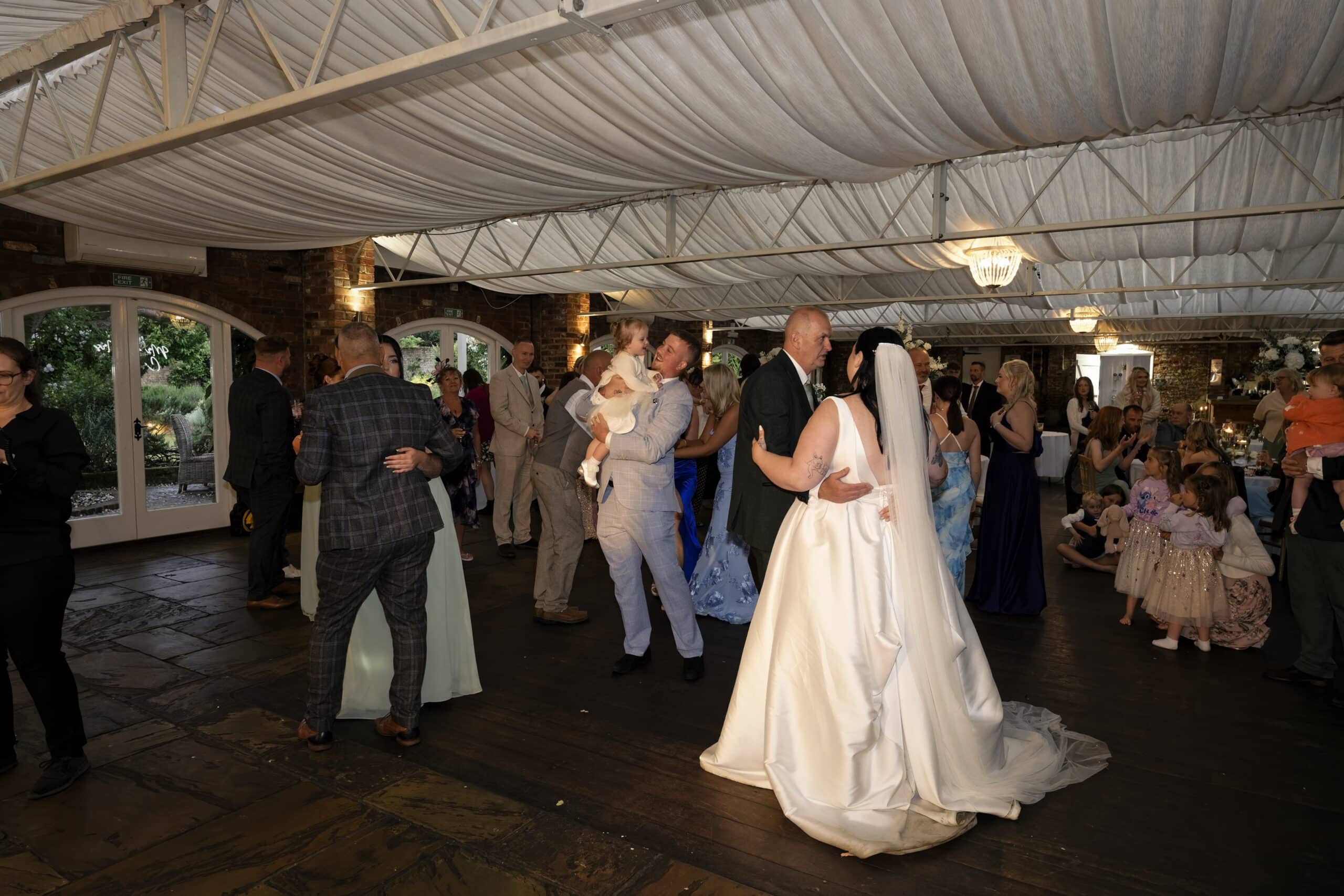 Wide shot of the first dance in the marquee