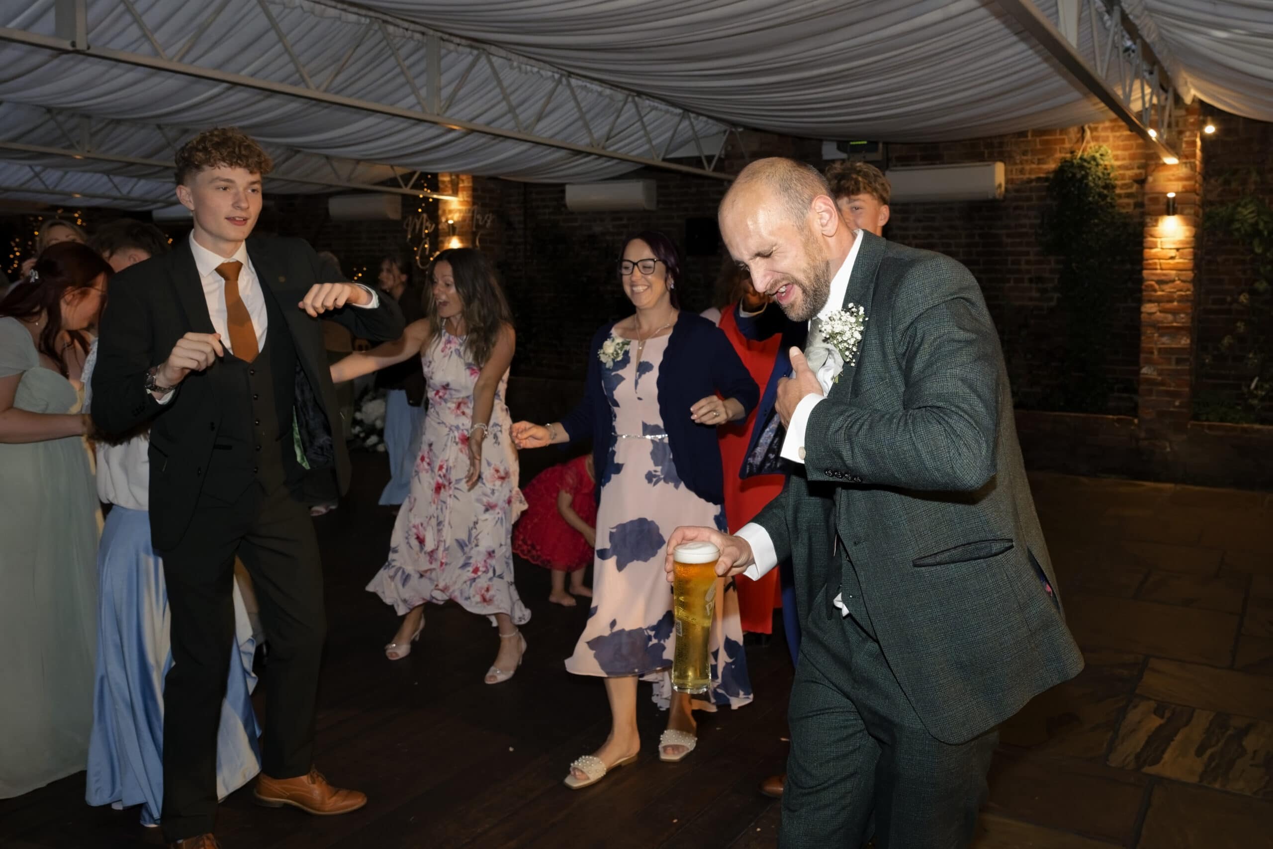 Guests dancing together in the evening