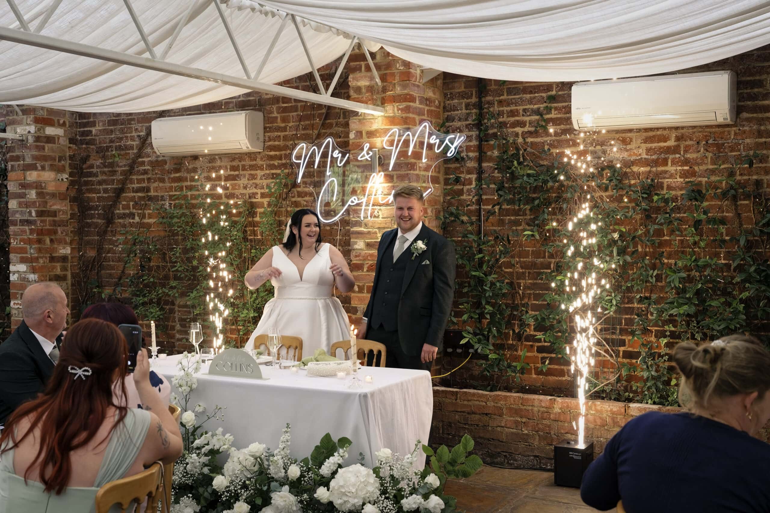 Bride and groom arriving at the top table with special effects
