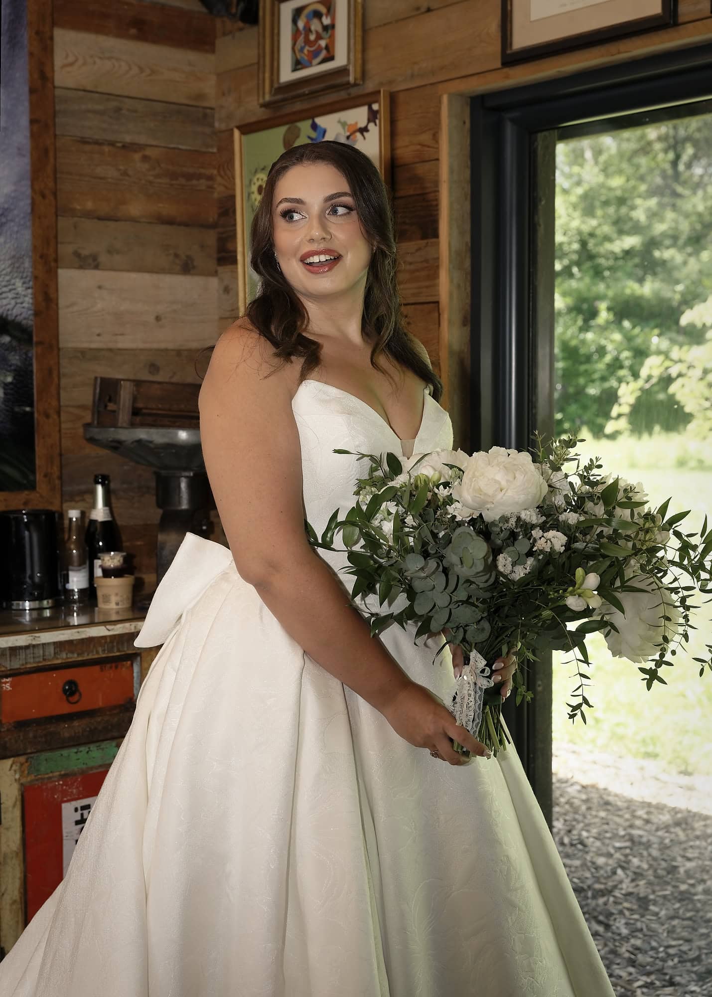 Bride's delighted reaction during a first look with her grandad at Tiger Lodge