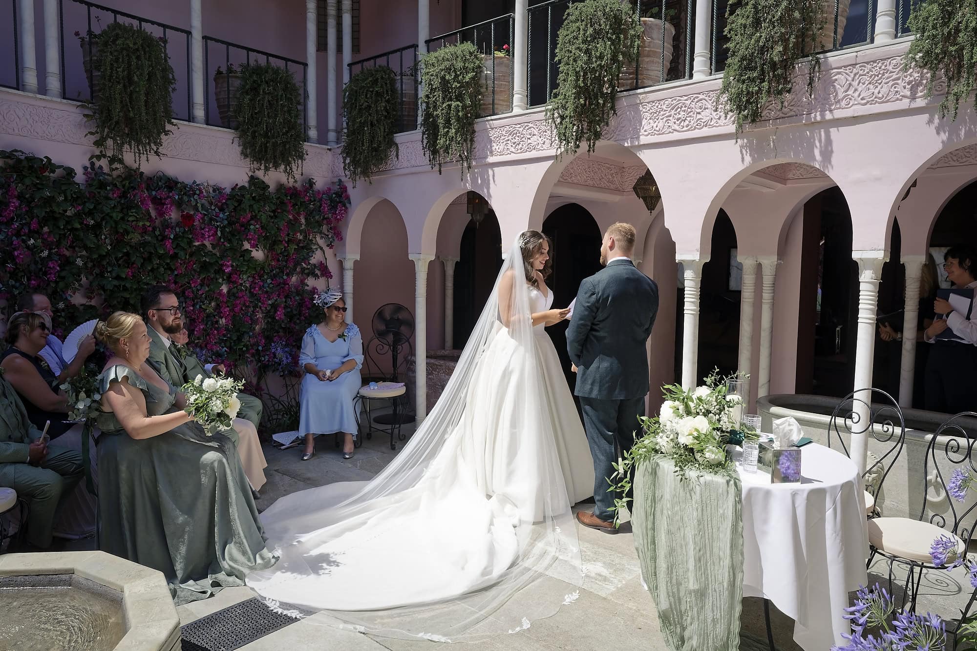 Bride reading her vows to Josh during the ceremony in the Moroccan Courtyard