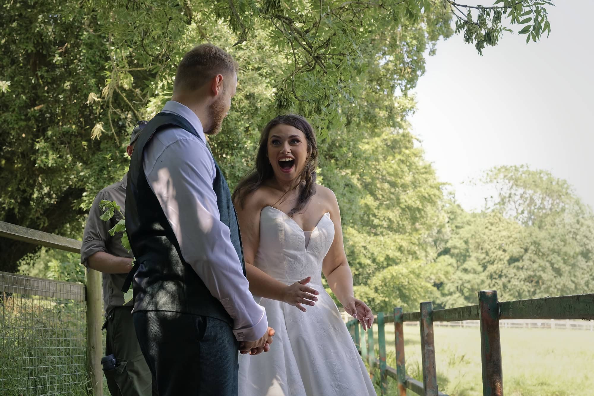 Bride's delighted surprise reaction on discovering the rhino feeding experience