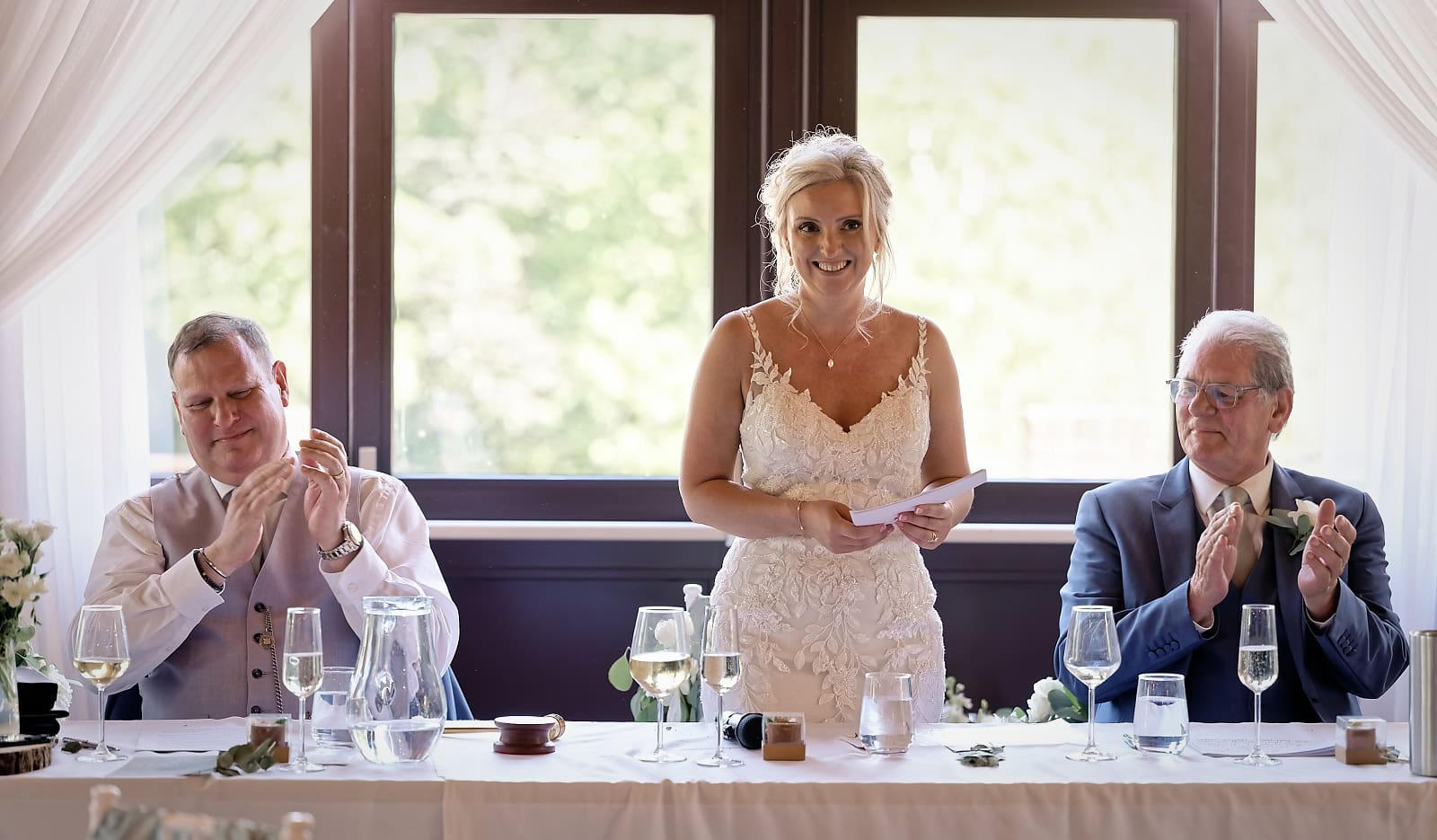 Bride giving her wedding speech at the top table, The Ravenswood