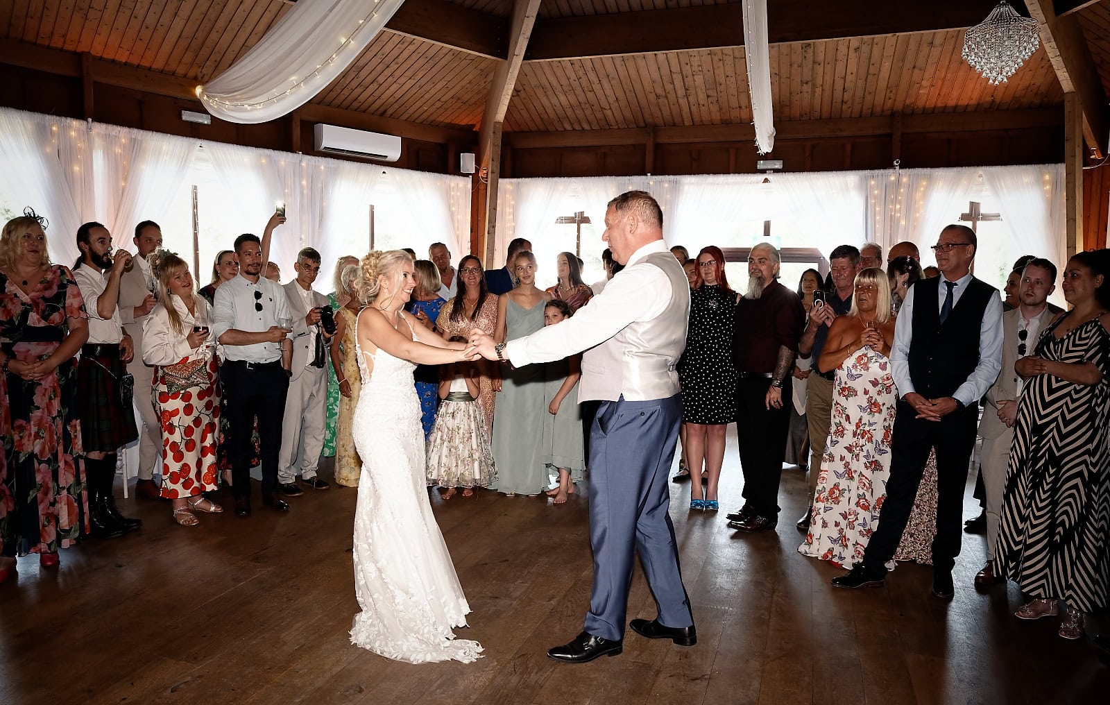 Bride and groom dancing together during their first dance at The Ravenswood